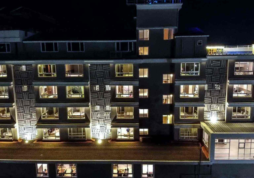 COSMIQUE CLARKS INN SUITES